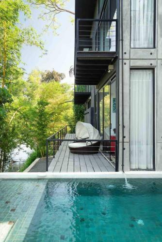 Ultramodern Riverfront Villa With Infinity Pool