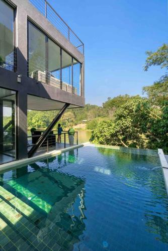 Ultramodern Riverfront Villa With Infinity Pool