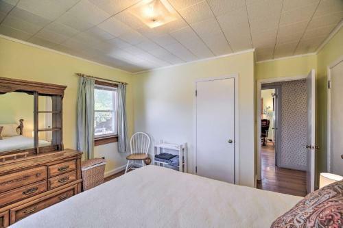 Quaint Creekside Home With Spacious Deck And Yard