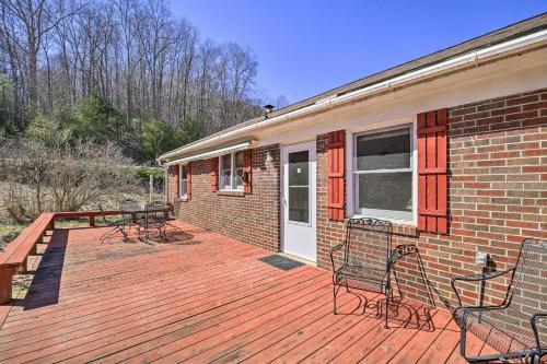 Quaint Creekside Home With Spacious Deck And Yard