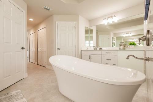 Waterfront Home With Golf Access & Heated Pool