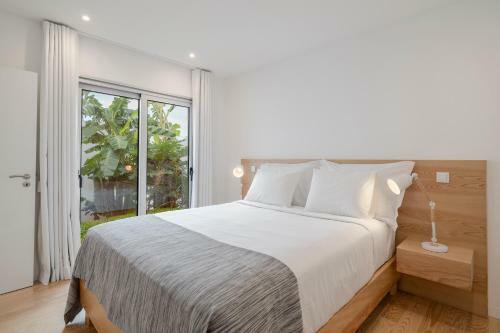 Casas Da Vargem Shared Swimming Pool By An Island Apart