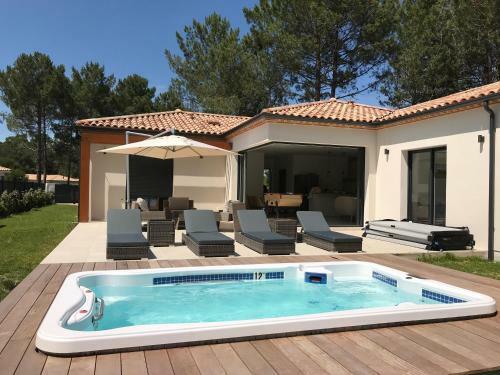 Location Villa Entre Lac Et Oc�an Avec Son Spa de Nage