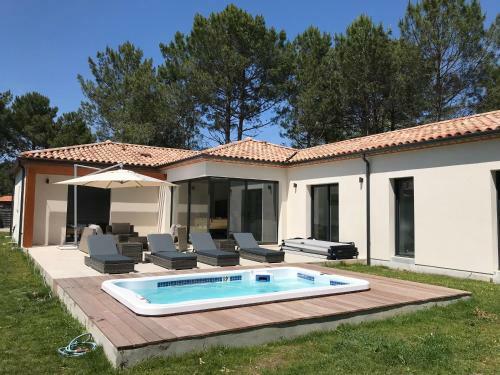 Location Villa Entre Lac Et Oc�an Avec Son Spa de Nage