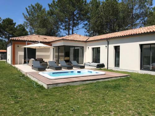 Location Villa Entre Lac Et Oc�an Avec Son Spa de Nage