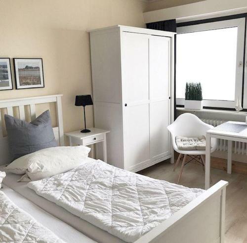 Apartamento Strandhotel-heiligenhafen-wohnung-214-typ-i
