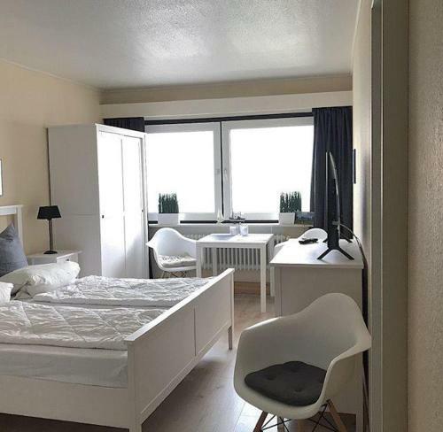 Apartamento Strandhotel-heiligenhafen-wohnung-214-typ-i