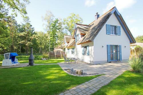 Ferienhaus Stranddistel Haus Terrasse, Garten, Eigene Sauna