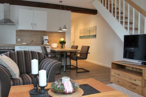 Apartamento Ferienwohnung Lodberger Scheunencafe