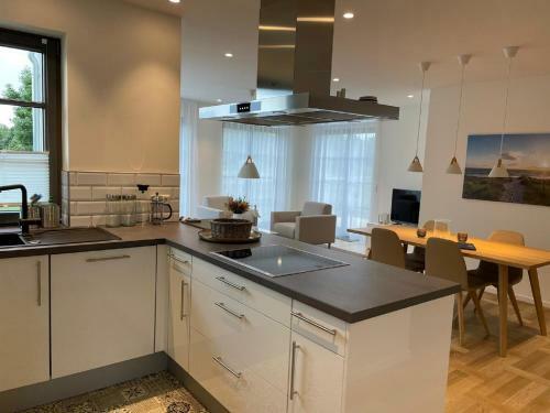 Apartamento Urlaub de Luxe Unter Reet Bach Ins