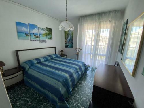 Apartment With Two Terraces Facing The Sea Next To The Beach