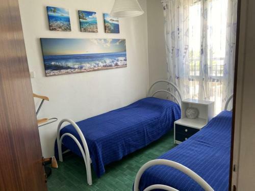 Apartment With Two Terraces Facing The Sea Next To The Beach
