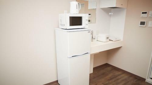 Hotel New Normal Condo In Naha Airport