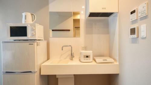Hotel New Normal Condo In Naha Airport
