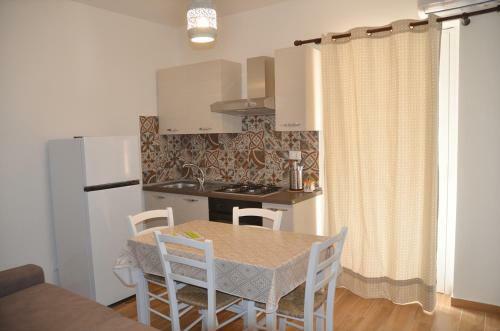 Apartamento Appartamenti La Baia Del Ra�s