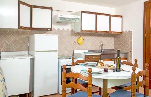 Apartamento Mono Capo Testa