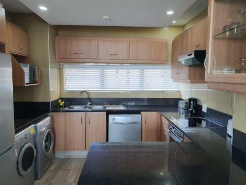 Accommodation Front - Gorgeous 4 Sleeper Beachfront Apartment