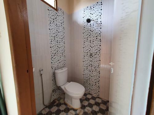 Hotel Oyo 90945 Arizon Kost