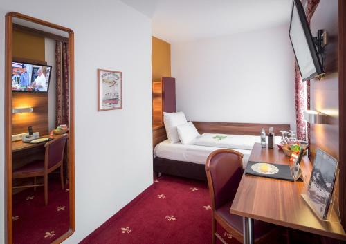 Tiptop Hotel Burgschmiet Garni