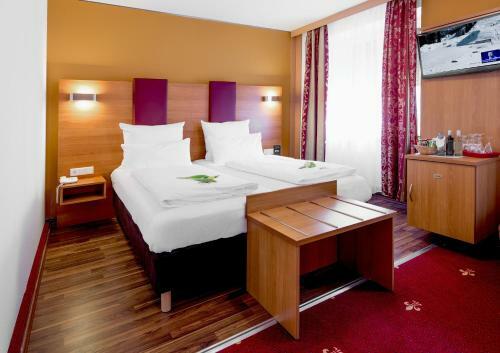 Tiptop Hotel Burgschmiet Garni