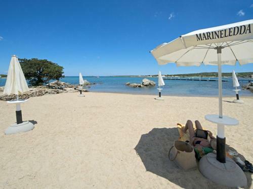Lovely Holiday Home In Marinella With Shared Garden