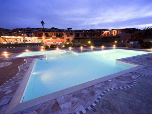 Lovely Holiday Home In Marinella With Shared Garden