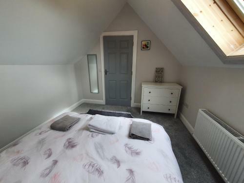 N0 2 Greystones Clock Tower Lodge