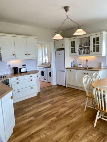 Apartamento Doughbeg Beach Cottage