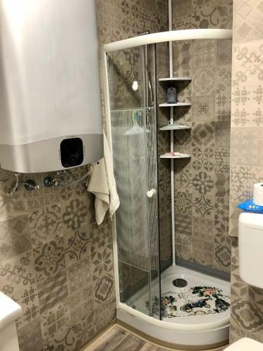 �va Apartman, Helikon-liget