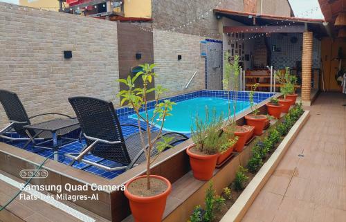 Flat Tr�s Milagres- Carolinda