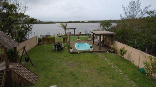 Casa Na Beira Da Lagoa Com Piscina E Rampa Para Embarca��es
