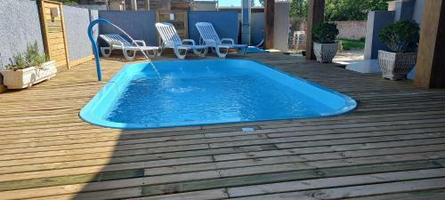 Casa Confort�vel Com Piscina Aquecida