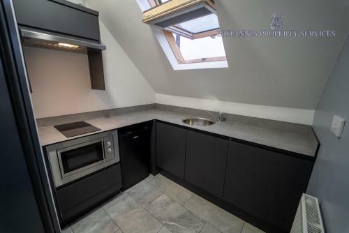 Apartamento Spacious Serviced Studio With Large Kitchenette