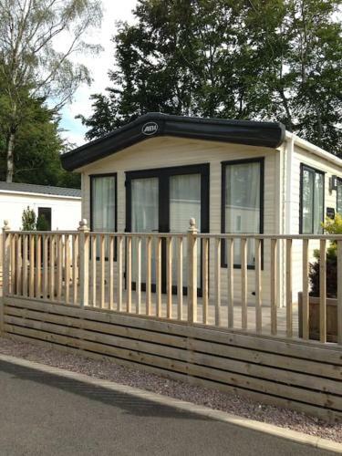 Woodpecker Lodge, Camelot Holiday Park, Ca6 5sz
