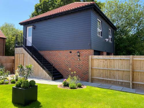 Apartamento Stansted Coach House