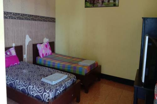 Oyo 90627 Hotel Mutiara