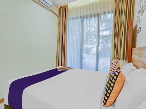 Hotel Spot On 90728 Griyapram Riverside Syariah