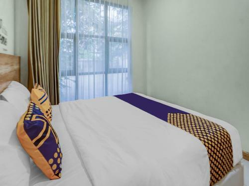 Hotel Spot On 90728 Griyapram Riverside Syariah