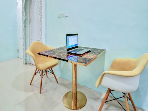 Hotel Spot On 90728 Griyapram Riverside Syariah