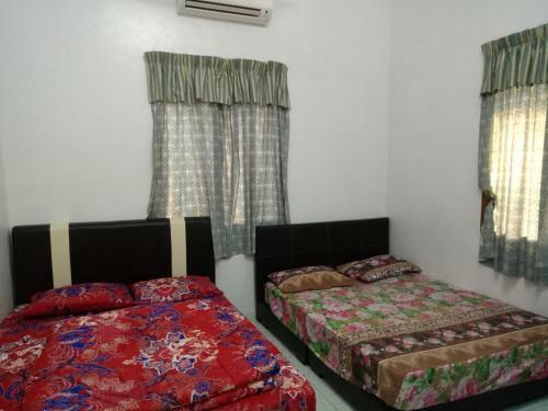 Apartamento Aiman Homestay