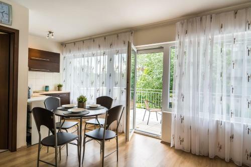 Siesta Sziget - Panor�m�s Balatonparti Apartmanok