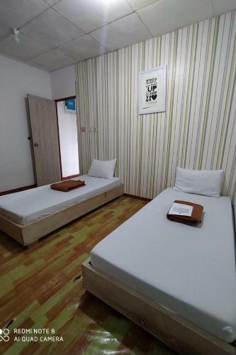 Hotel Banana Home Stay Syariah Redpartner
