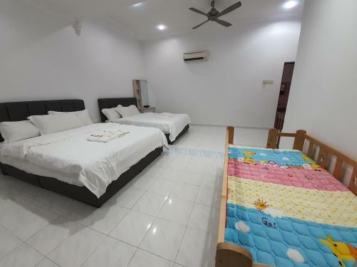 Bersatu Queenco Homestay Muar
