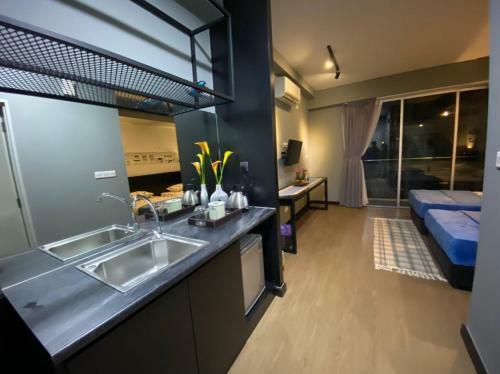 Apartamento Aeropod Rhy Homey Home Stay
