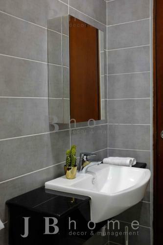 Apartamento Paragon Residences Straits View Homestay