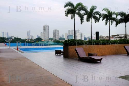Apartamento Paragon Residences Straits View Homestay