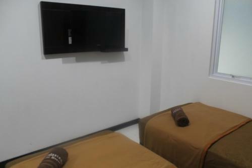 Hostal Mandastana Guest House And Kost