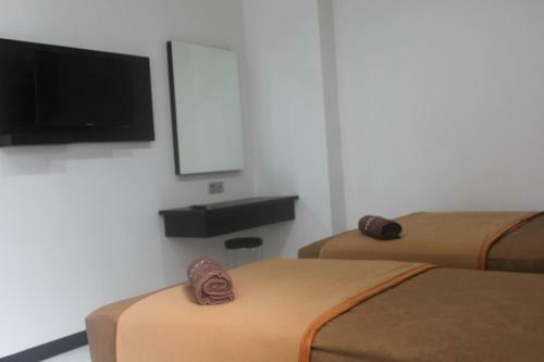 Hostal Mandastana Guest House And Kost