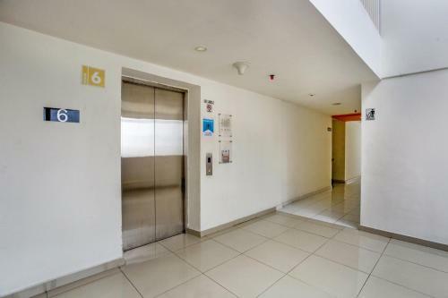 Hotel Oyo 3247 Afira Rooms Aeropolis