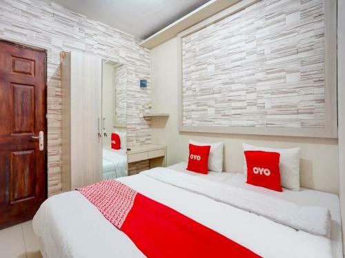 Hotel Oyo 90606 Glass House Citraland